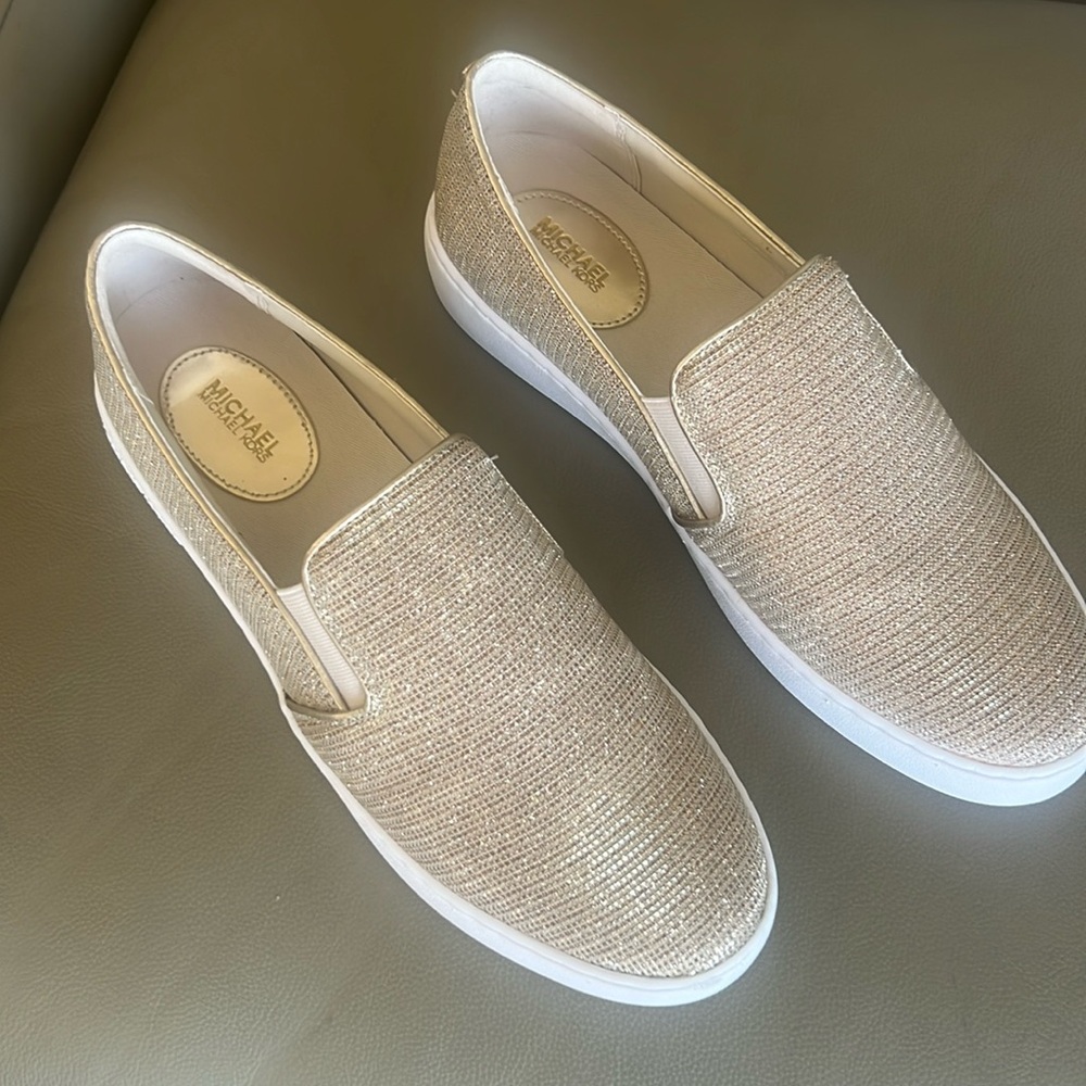 Michael Kors gold flats